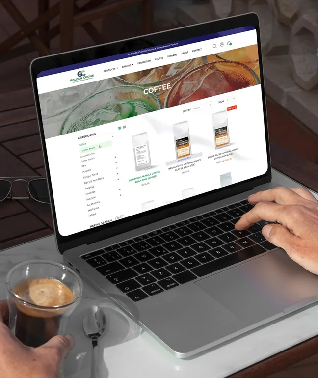 Laptop showing a coffee brand online store product catalogue