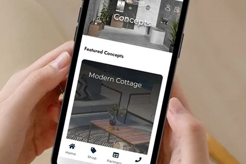 Smartphone showing a mobile interior design website