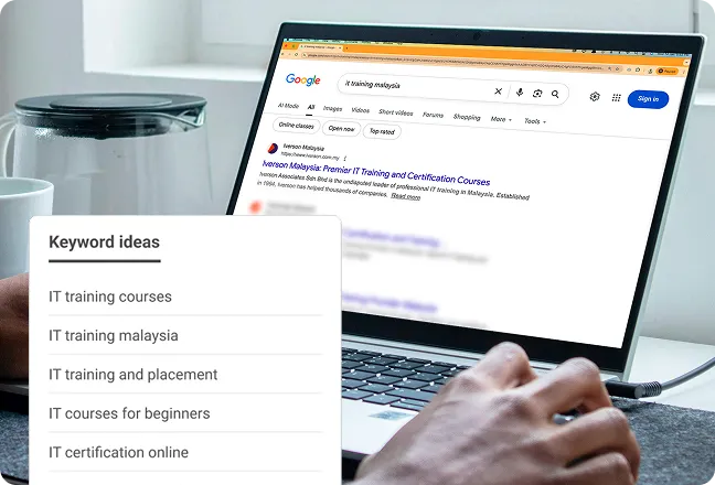 Keyword ideas for IT training courses beside Google search results on a laptop